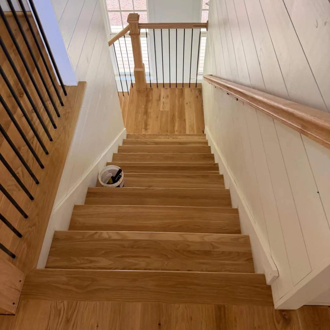 New hardwood stairs with black railings