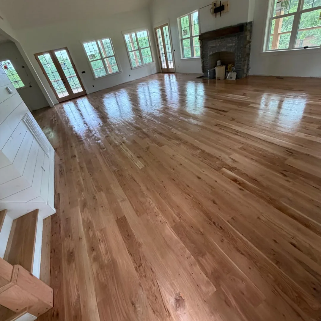 Freshly refinished hardwood floors in new build