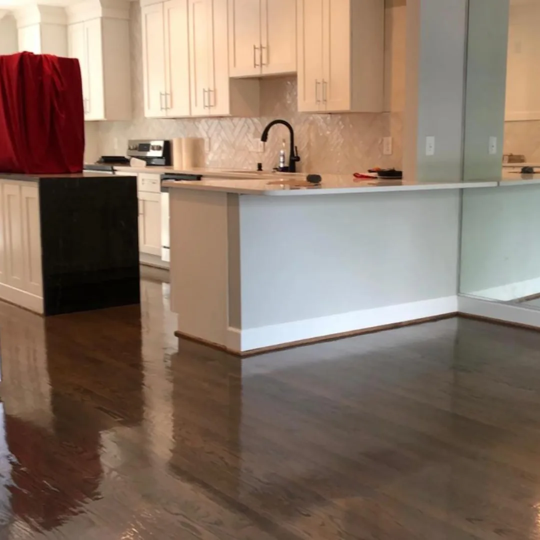 Newly refinished hardwood floors in kitchen