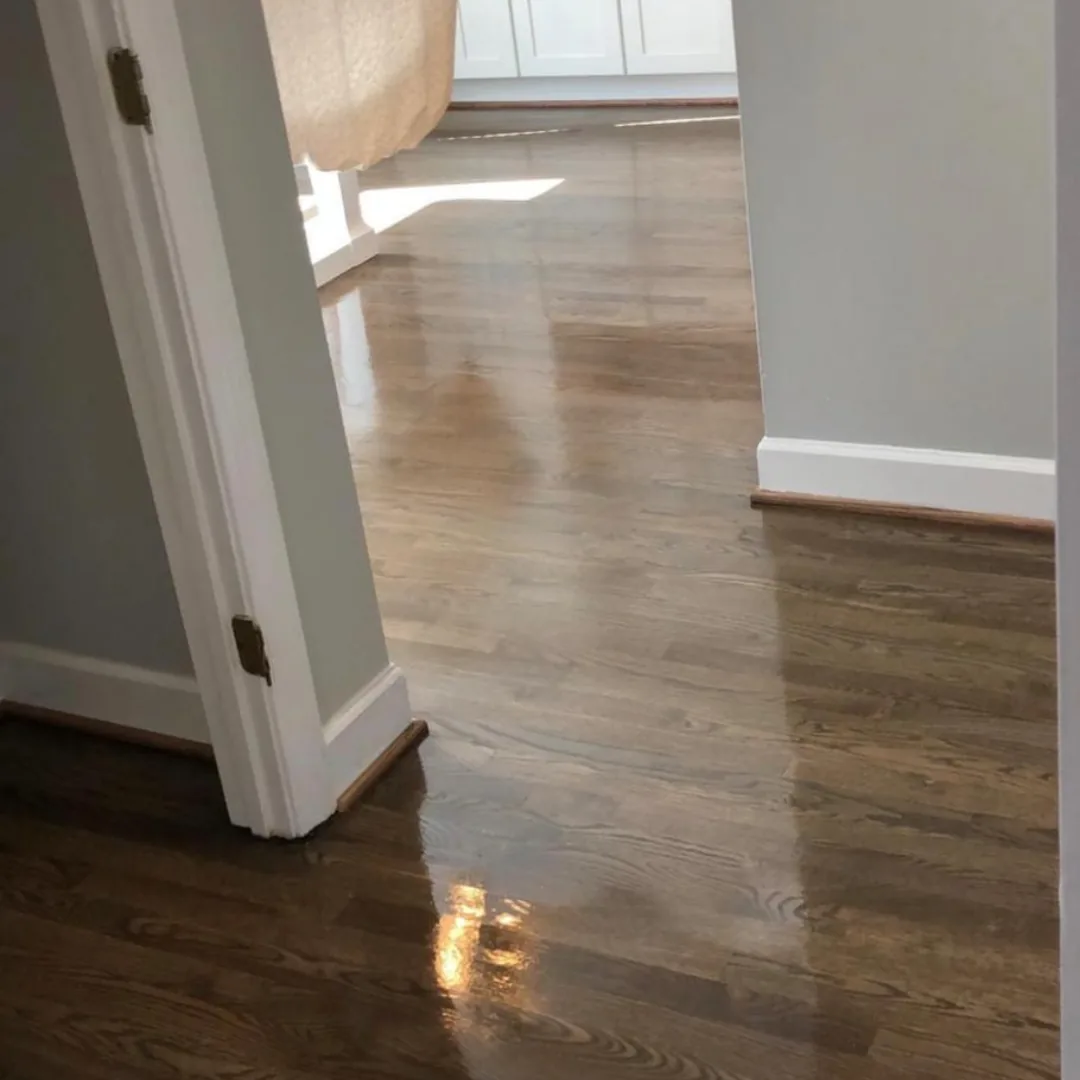 Refinished hardwood floors with shiny new finish