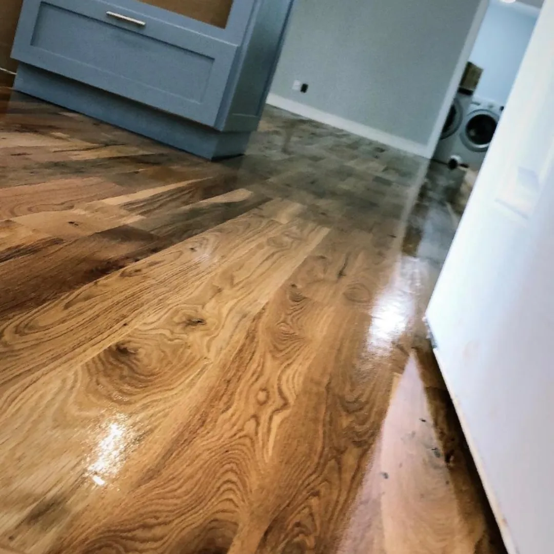 Shiny new hardwood flooring in home interior