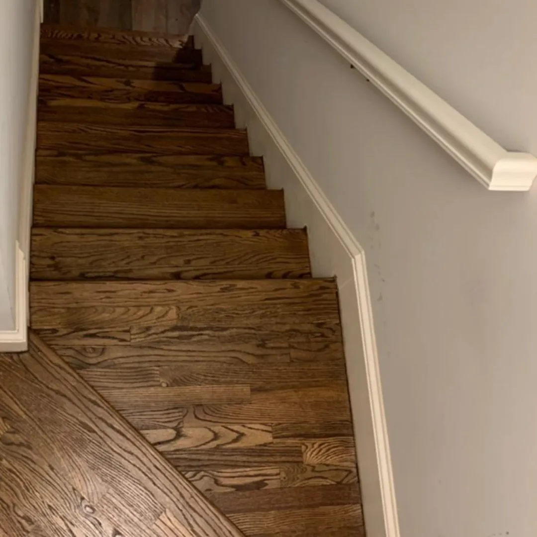 Dark hardwood stairs and landing